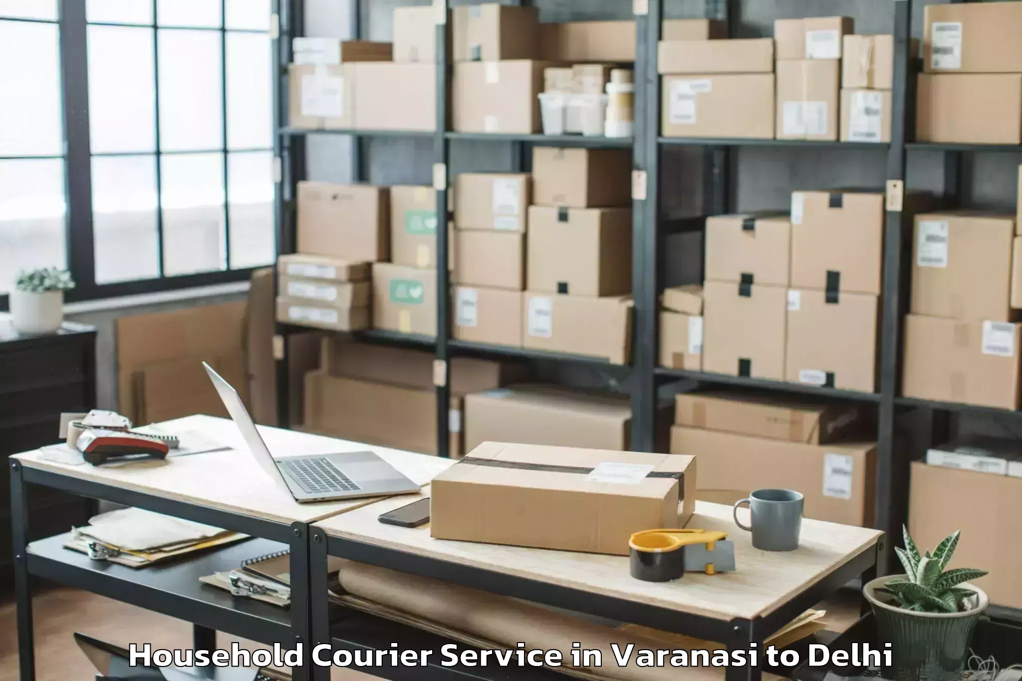 Book Varanasi to Jamia Hamdard New Delhi Household Courier